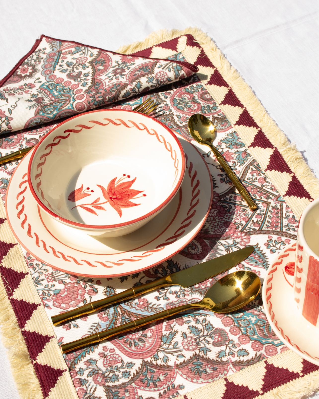 INDIVIDUAL AND BURGUNDY FLORAL NAPKINS