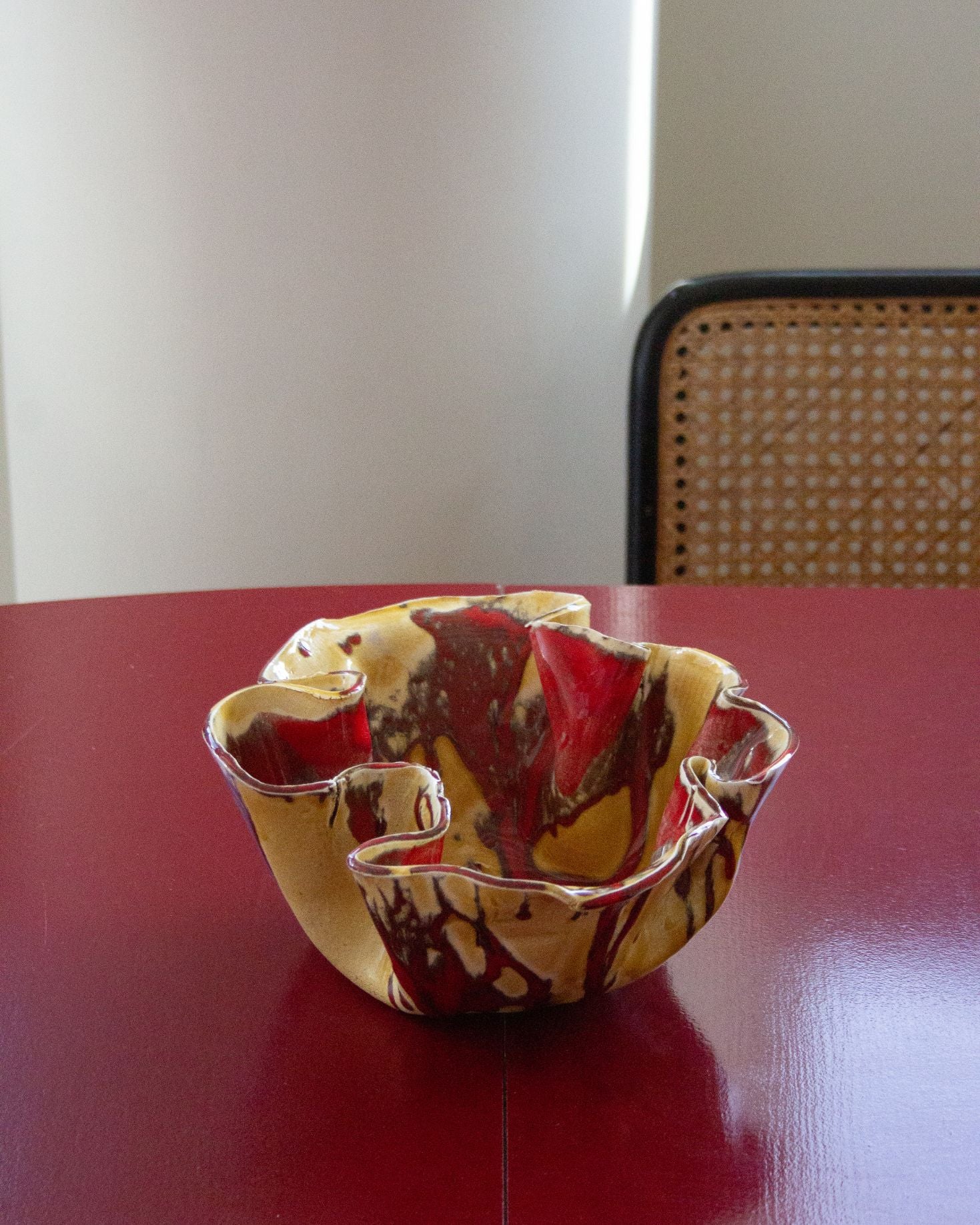 MEDIUM POTTERY BURGUNDY AND MUSTARD